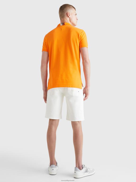 برتقال هاواي Tommy Hilfiger شعار أيقونات بولو ذو مقاس عادي 446441123