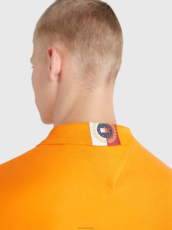 برتقال هاواي Tommy Hilfiger شعار أيقونات بولو ذو مقاس عادي 446441123
