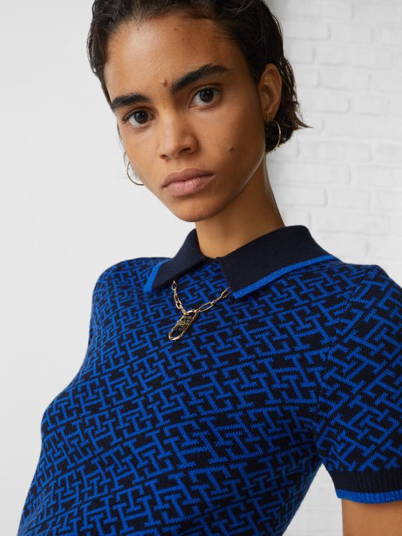 سماء الصحراء Tommy Hilfiger قميص بولو بقصة ضيقة من ميرينو 446442347