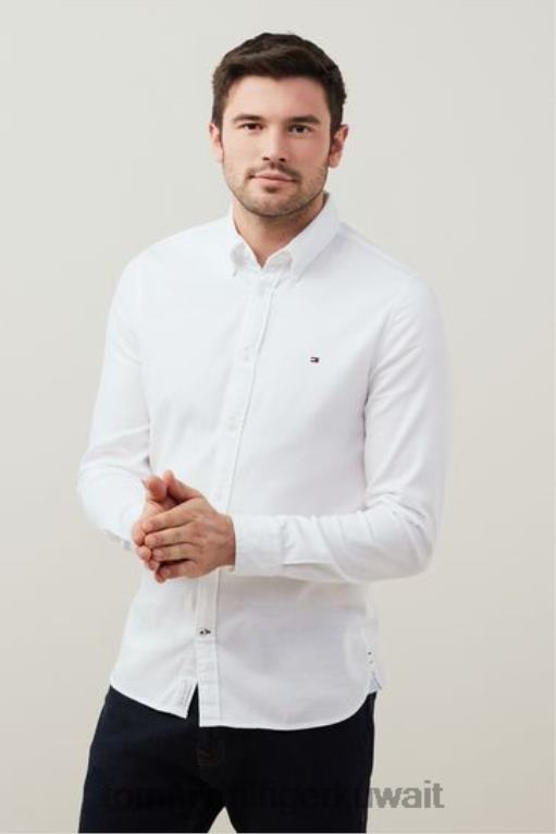 أبيض Tommy Hilfiger قميص كور فليكس دوبي ذو قصة ضيقة 446443427