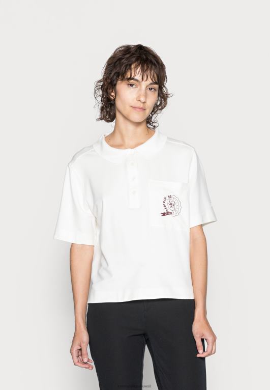 بيج فاتح Tommy Hilfiger قميص بولو بشعار مريح 446444984