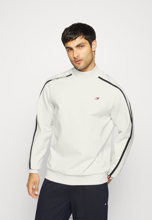 عاج Tommy Hilfiger سترة صورة ظلية برقبة وهمية مزخرفة 446445919