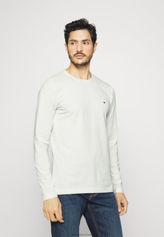 عاج Tommy Hilfiger تيشيرت بأكمام طويلة وقصة ضيقة قابلة للتمدد 446447559